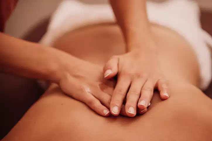 A person is being pampered with a gentle back massage.