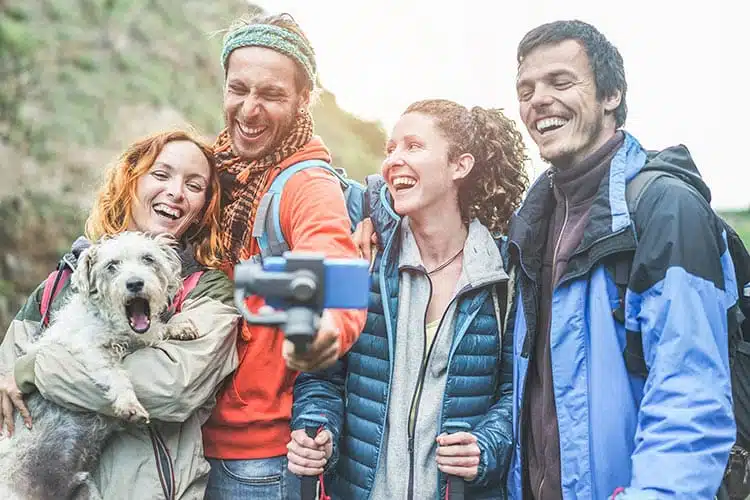 Happy Trekkers People Making Video Vlog With Gimbal Phone Young Hiker Friends Having Fun Mountain